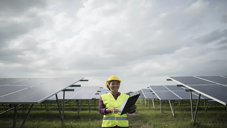 Engineer electric woman checking and maintenance of solar cells